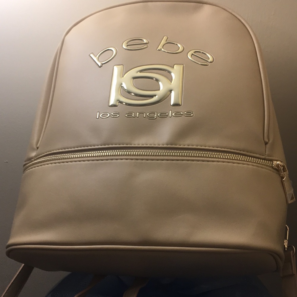 Up for sale lovely cream/tan backpack ! Perfect for the one you care about !